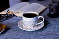 Hand painted ceramic cup with saucer. Colourful Polka Dots.