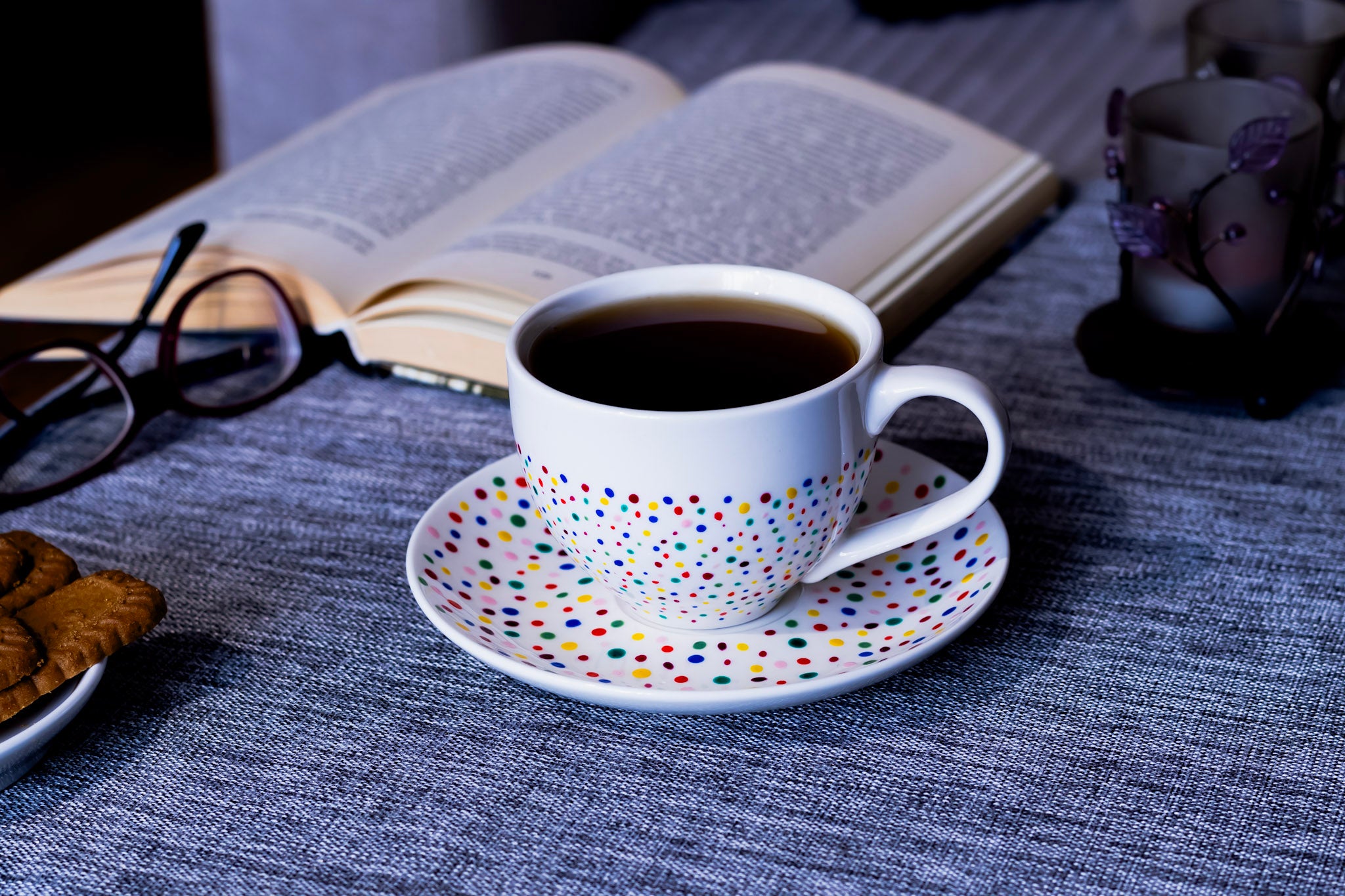 Hand painted ceramic cup with saucer. Colourful Polka Dots.