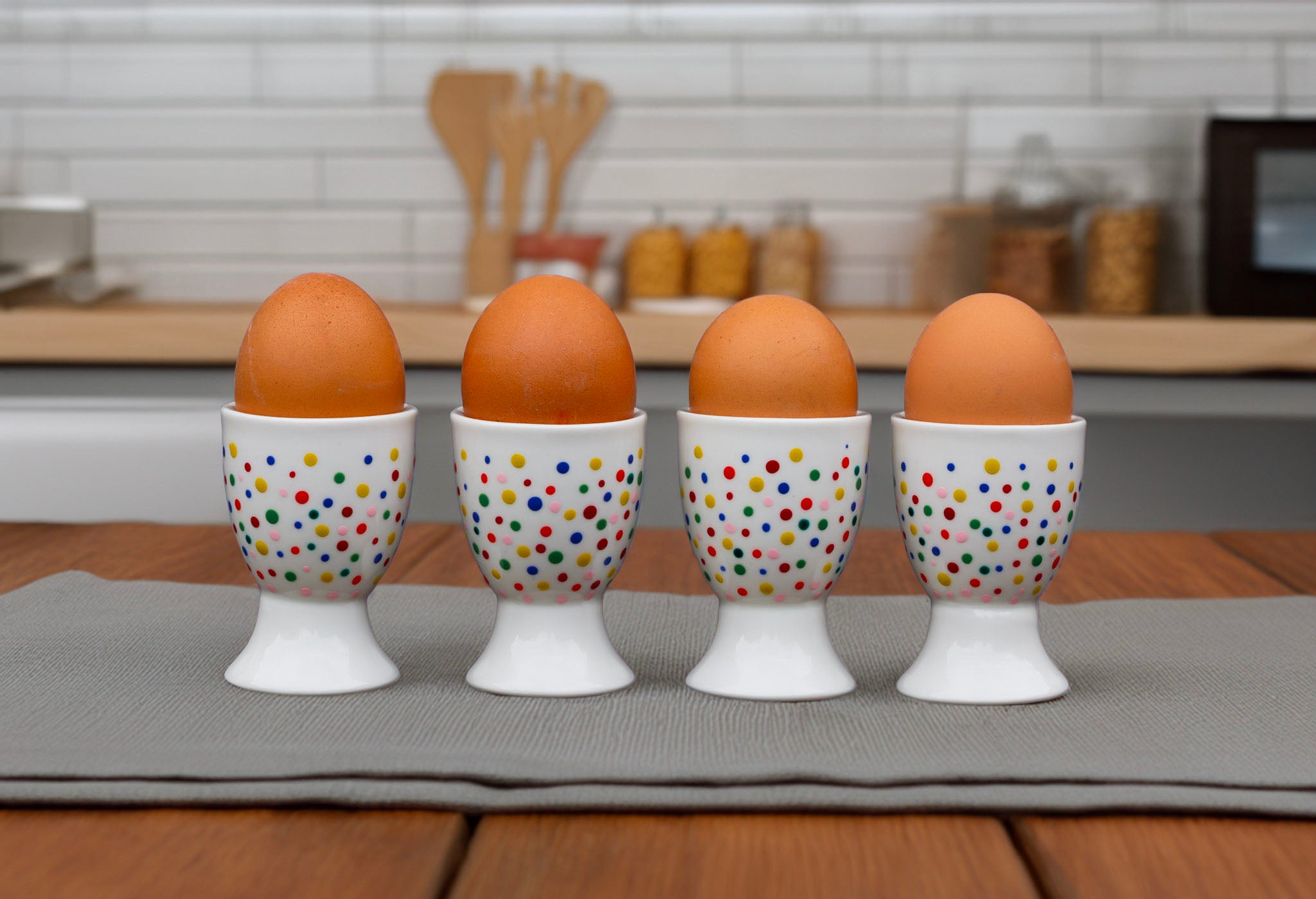 Hand painted ceramic egg holders. Colourful Polka Dots