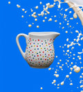 Hand painted ceramic milk jar. Colourful Polka Dots.