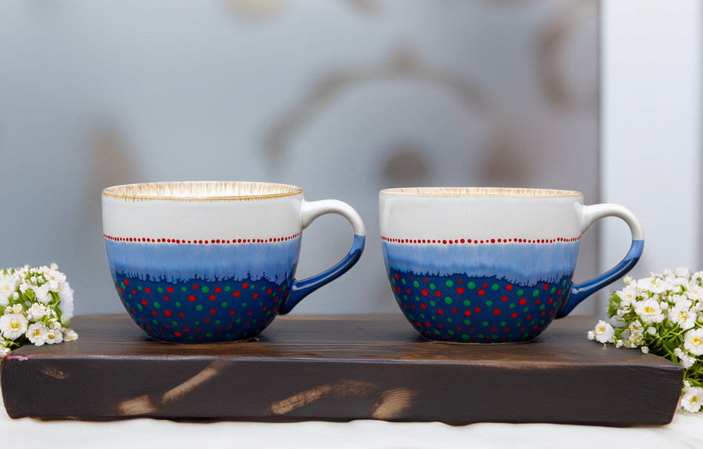 Hand painted ceramic Cappuccino mug. White, blue, red, orange, green.