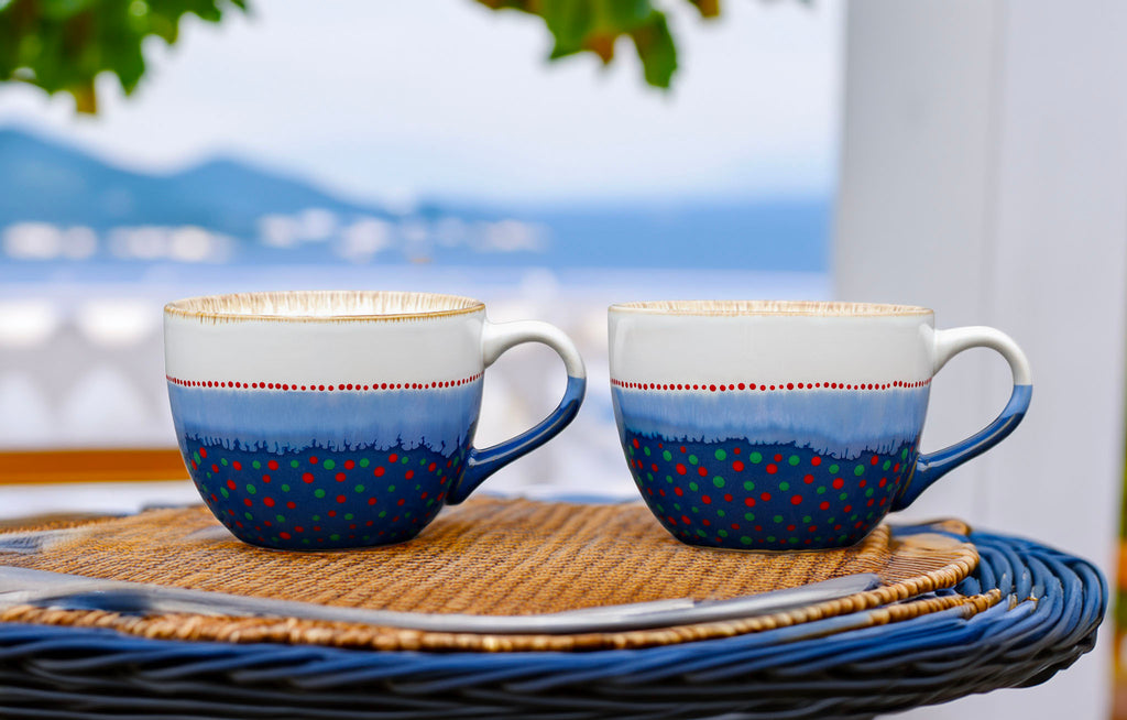 Hand painted ceramic Cappuccino mug. White, blue, red, orange, green.