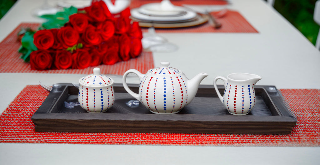 Hand painted ceramic sugar bowl. Blue and red. Polka Dots.