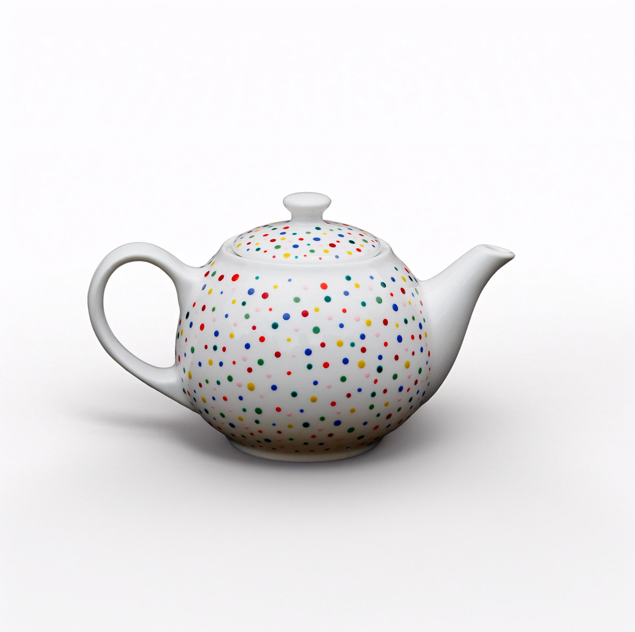 Hand painted ceramic tea pot. Colourful Polka Dots.