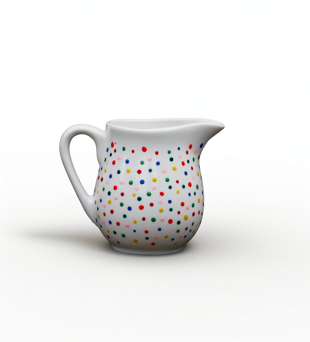 Hand painted ceramic milk jar. Colourful Polka Dots.