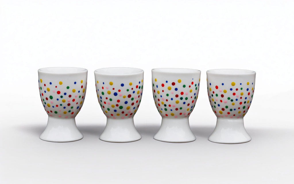 Hand painted ceramic egg holders. Colourful Polka Dots